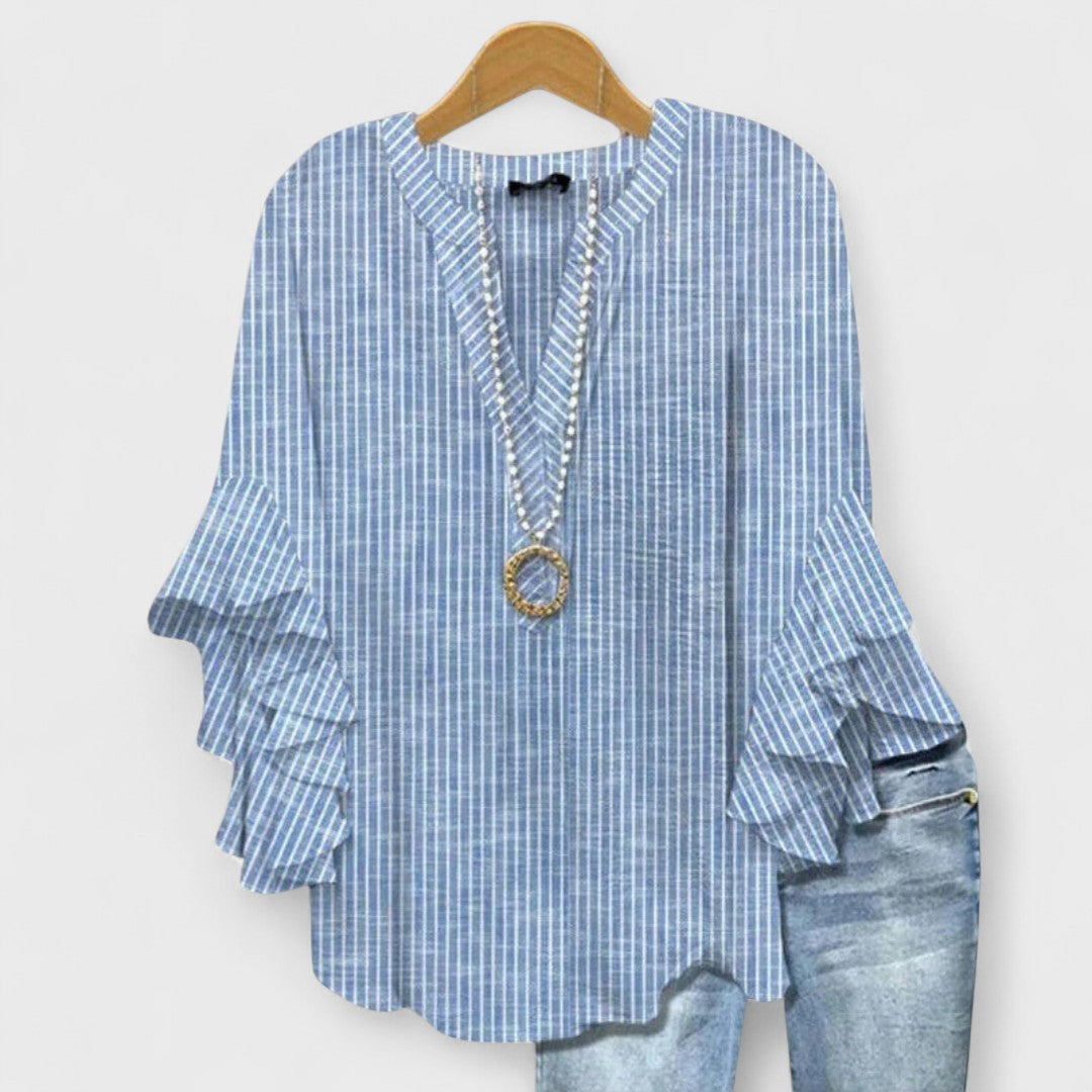 Izabell – Blus med eleganta blommönster