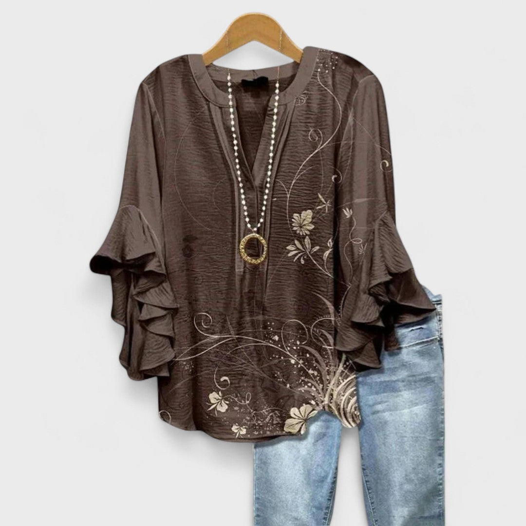 Izabell – Blus med eleganta blommönster