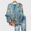 Izabell – Blus med eleganta blommönster