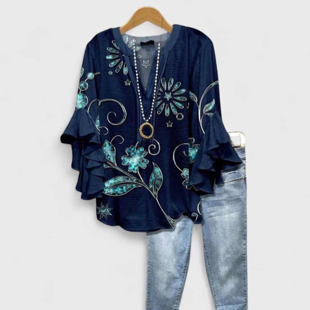Izabell – Blus med eleganta blommönster